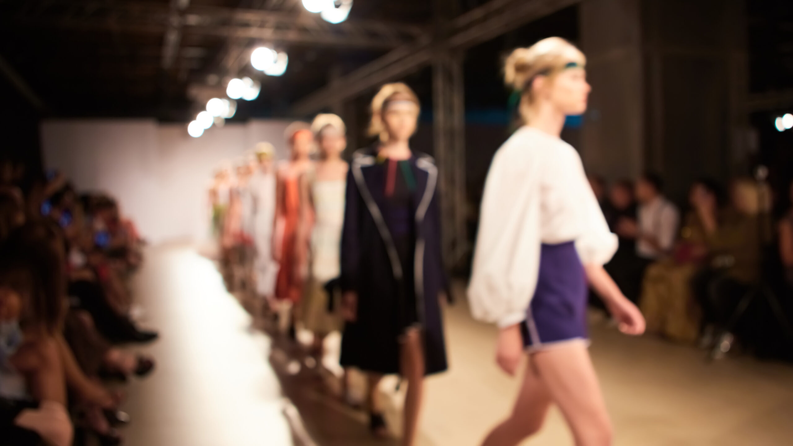 Fashion runway out of focus. The blur background